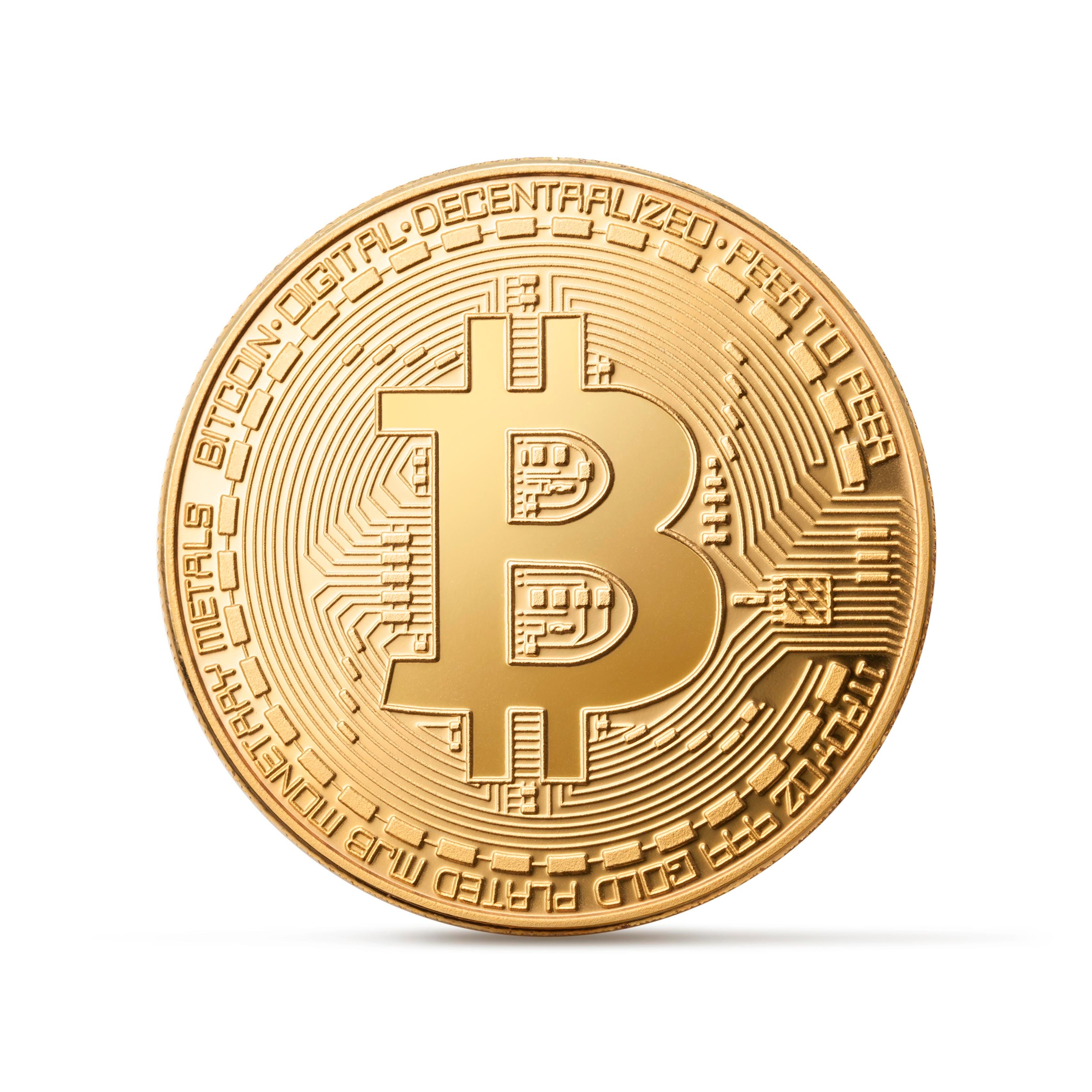 A physical unit of Bitcoin on a white background